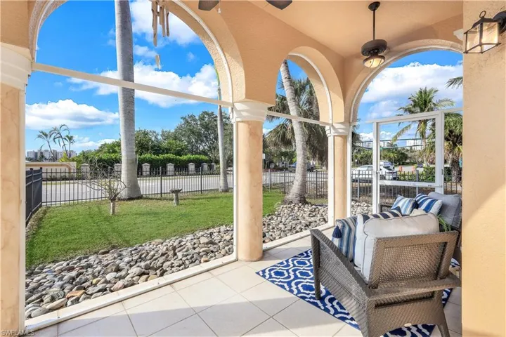 View of Vanderbilt Drive from screened in front lanai.