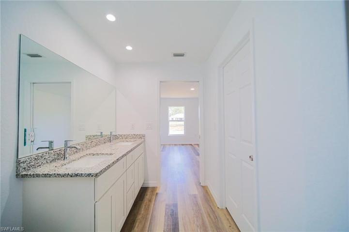 The Master Bathroom Has Dual Sinks, A Walk-In Tile Shower, And A Large Linen Closet!