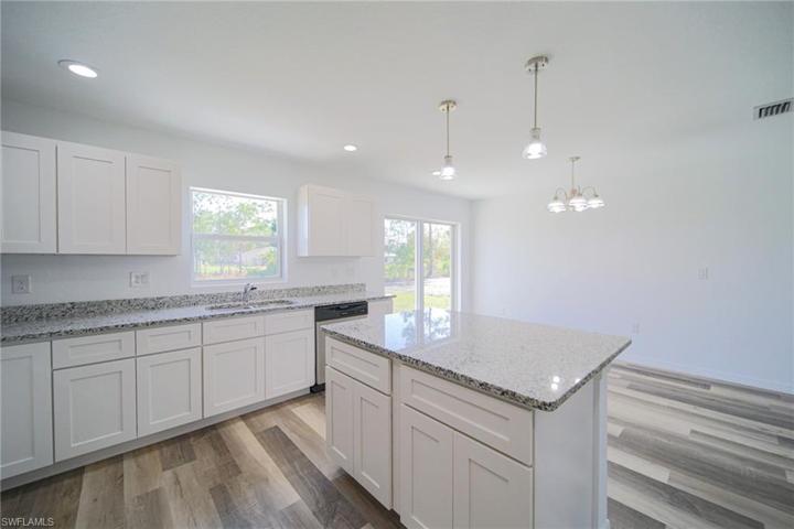 The Island Kitchen Has Granite Countertops, Soft Touch Real Wood Cabinets & Drawers, Stainless Steel Appliances, And An Oversized Walk In Pantry!