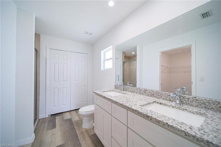 The Master Bathroom Has Dual Sinks, A Walk-In Tile Shower, And A Large Linen Closet!