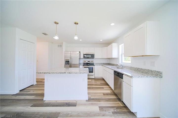 The Island Kitchen Has Granite Countertops, Soft Touch Real Wood Cabinets & Drawers, Stainless Steel Appliances, And An Oversized Walk In Pantry!