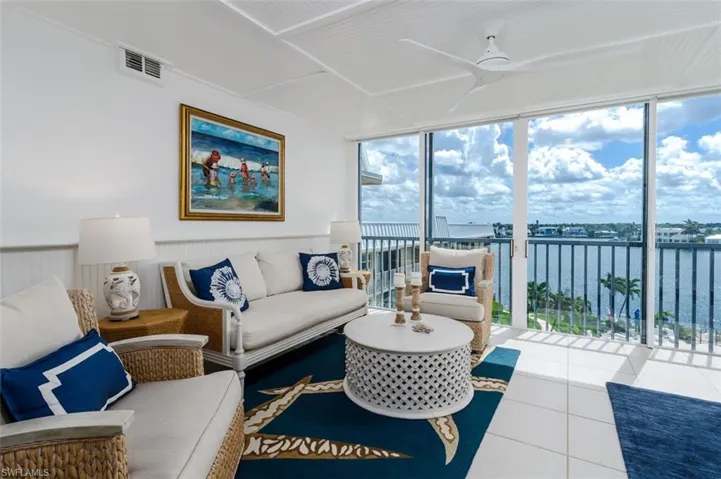 Tons of Seating Room throughout this water front home,