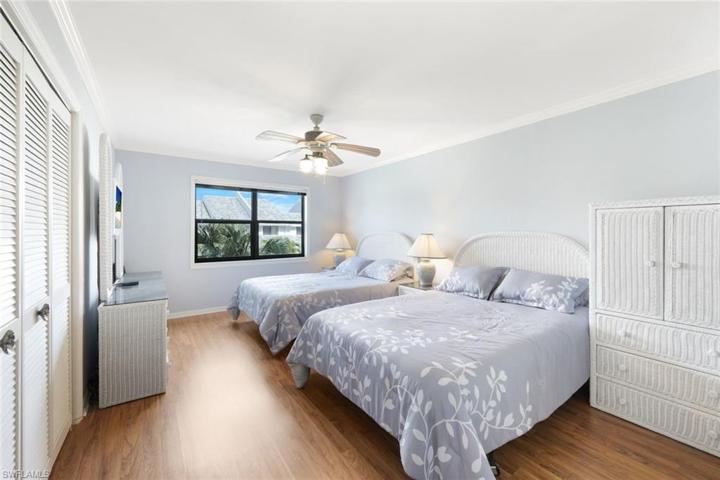 Second Suite- Shown with Two Queen Beds and Full Set of Dressers- LVT Flooring