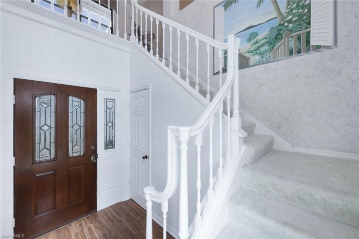 Front Entry-LVT Flooring, Storage - Cathedral Entry to Second Floor Condominium