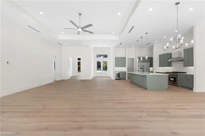 3rd and 4th bedroom access to the left and large home office next to main entrance.