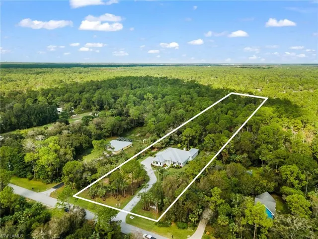 Large 2.5 acre, 165' x 662' lot. Space for guest house, horse barn, warehouse, organic gardening,..