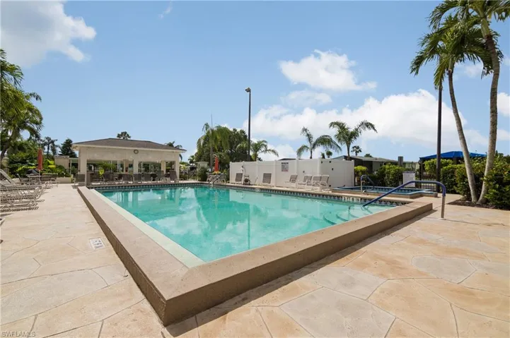 Community pool featuring a patio area