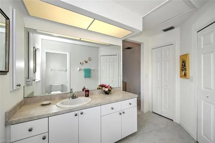 Bathroom with vanity and toilet