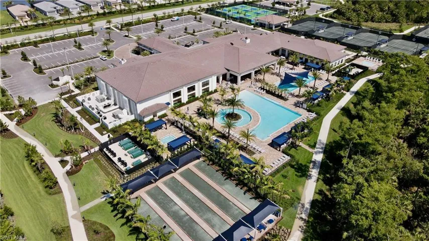 Aerial overview of property's location featuring a pool area