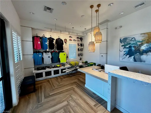 Mudroom featuring parquet flooring