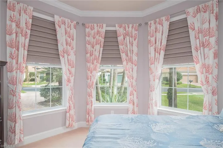 Unfurnished bedroom featuring carpet floors and ornamental molding