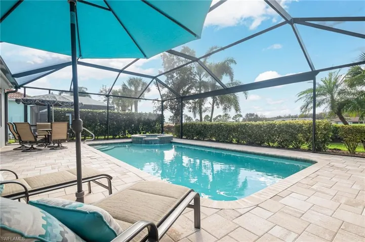 View of pool featuring an in ground hot tub, and a patio area