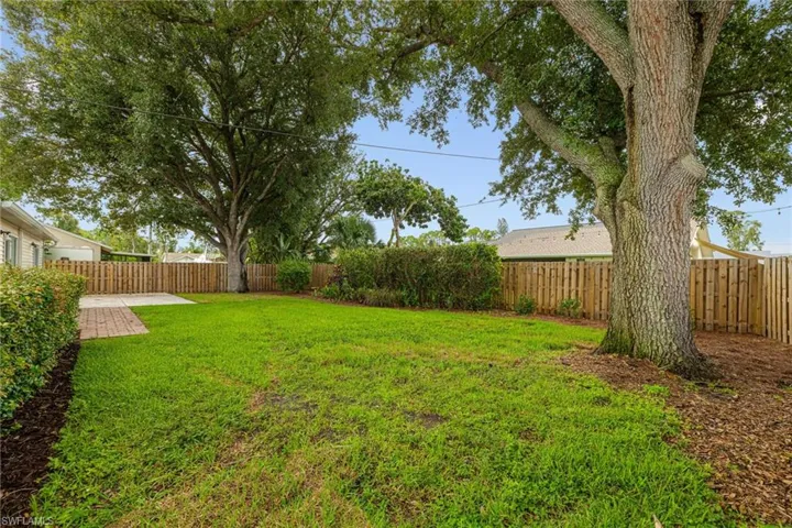 View of fenced backyard