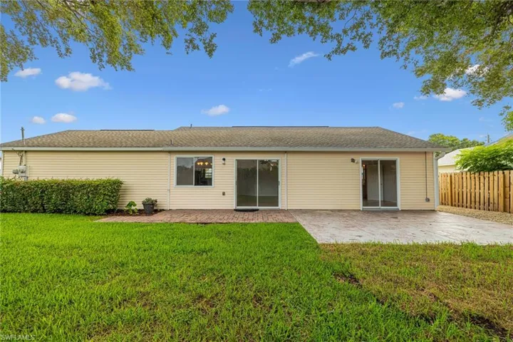 Rear view of house with a patio
