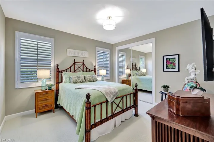Bedroom with carpet floors and a closet