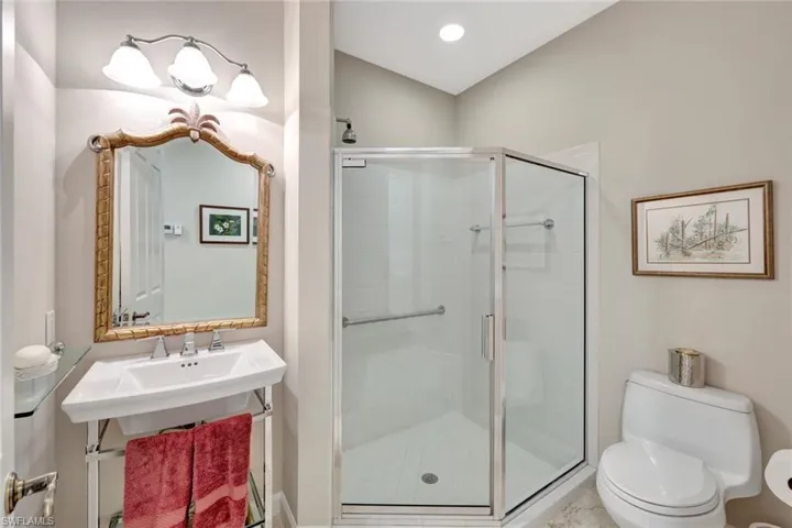 Guest half bath with new sink and mirror and light fixture