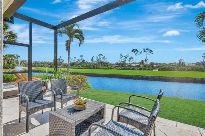 View of patio / terrace with a water view