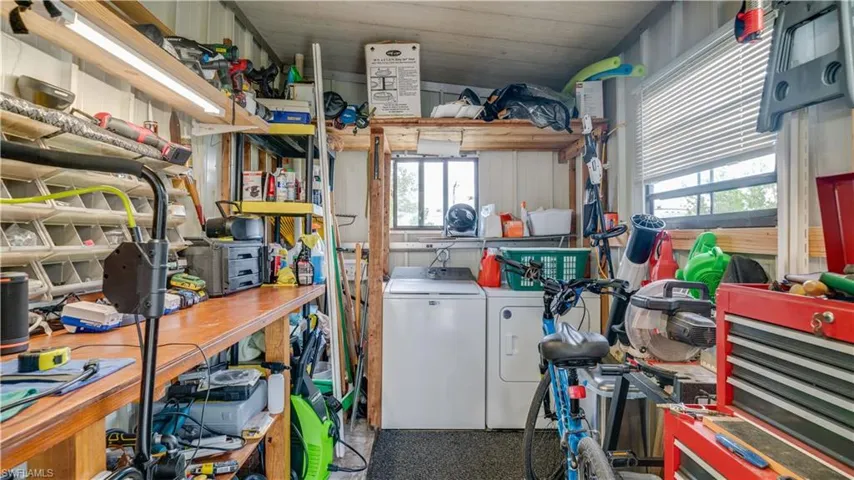 The built-in workbench is new (2023) and is the perfect space for those hands-on projects . The dryer is newer (2022). Need additional storage? This shed offers it!