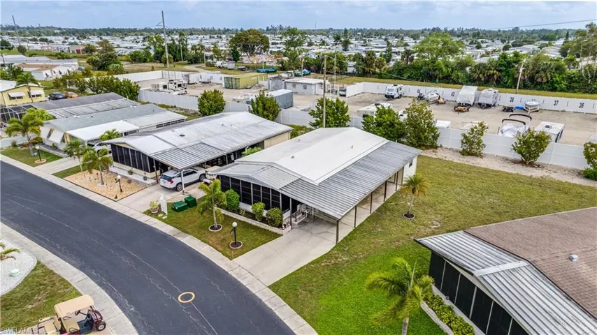 The oversized pie shaped lot, and the white privacy fence, insures ample room on this quiet street.