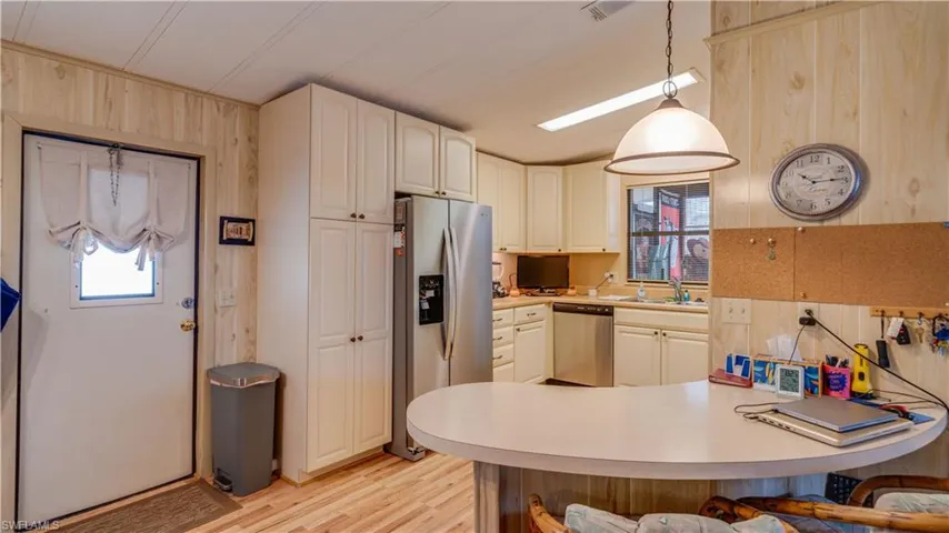 The floor to ceiling pantry offers much storage.