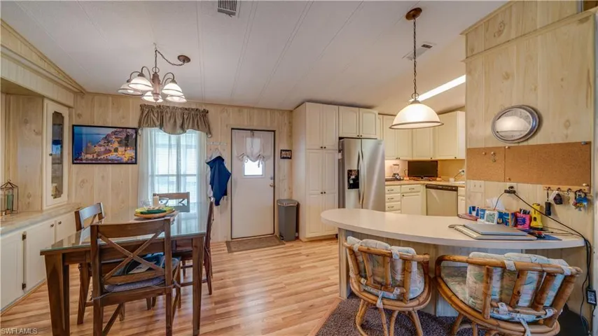 Enjoy the convenience of a breakfast bar and a nice sized dining area; both just steps from the kitchen.