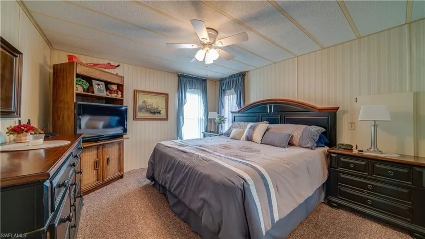 The guest room easily houses a king size bed and large furniture. Yes; this home is being sold furnished!