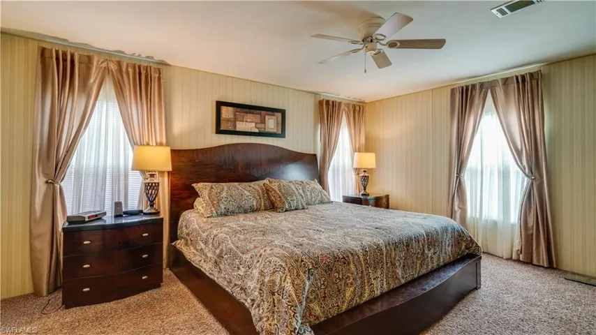 This master suite is extra large. And yes; the lovely bedroom furniture does convey.