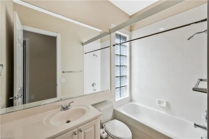 Full bath featuring bathing tub / shower combination and vanity