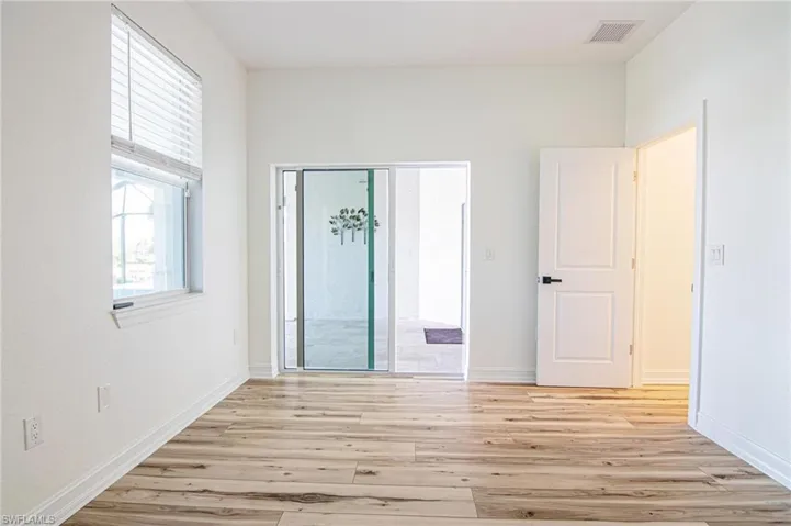 Bedroom #3 with glass sliding and pool/patio access