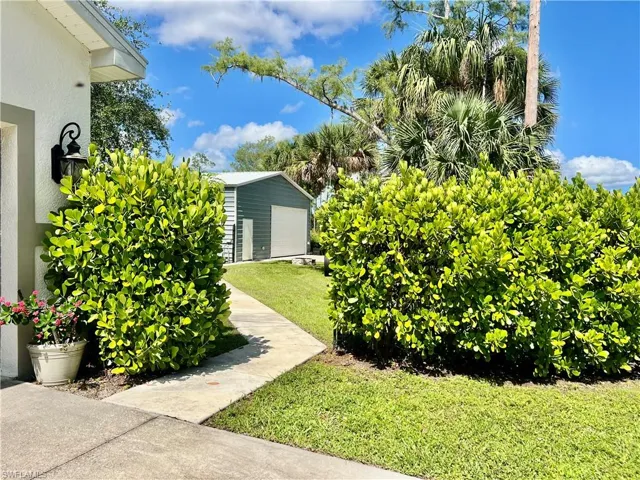 Walkway from home to detached garage.