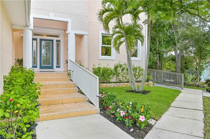 Property entrance with stucco siding
