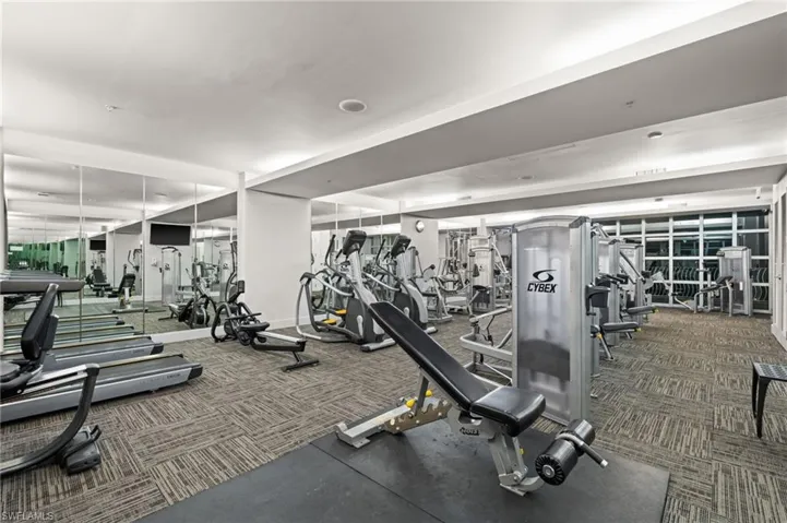 Gym featuring carpet
