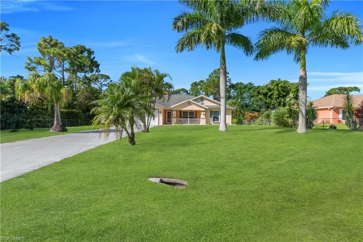 Single story home featuring driveway
