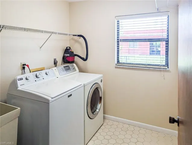 Was tub, and open closet and shelves