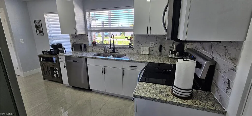 251 SE 46th  ST, Cape Coral, FL 33904