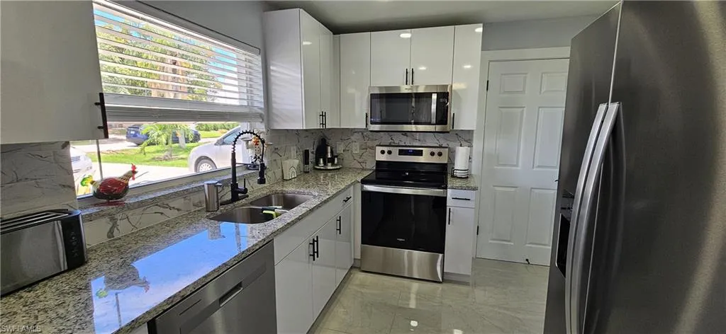 251 SE 46th  ST, Cape Coral, FL 33904