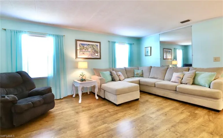 Living room featuring hardwood / wood-style flooring