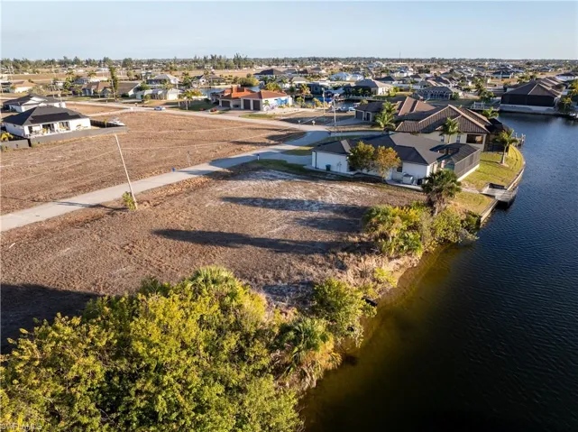 Aerial view of residential area with a nearby body of water