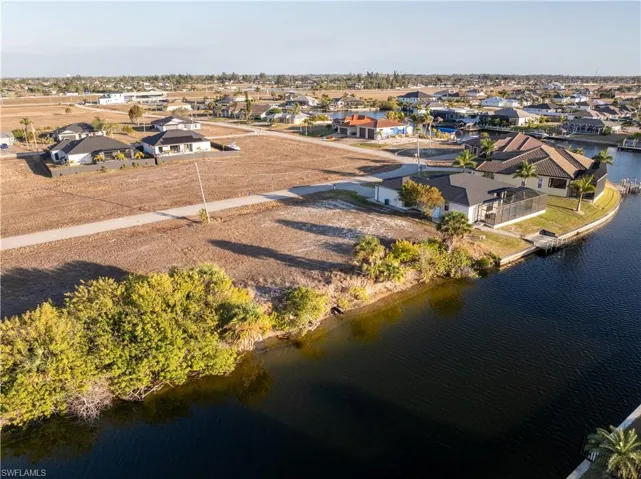 Aerial view of residential area with a large body of water