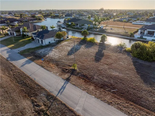 Aerial view of residential area with a large body of water
