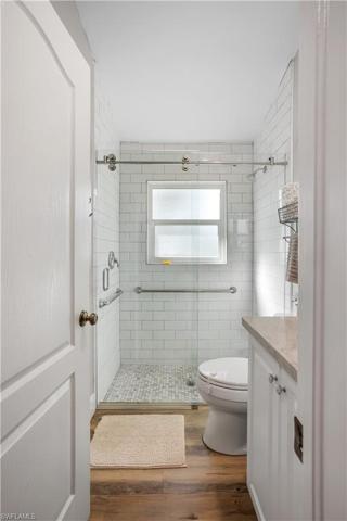 Guest Bath w sliding glass door and quartz counters