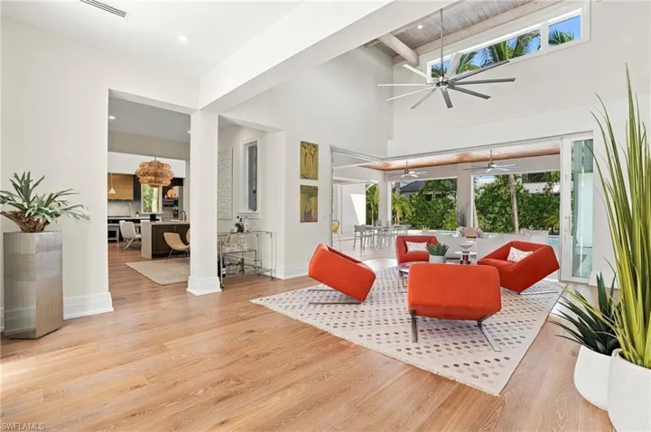 The home is filled with high ceilings, all with custom detail, and beautiful European flooring throughout