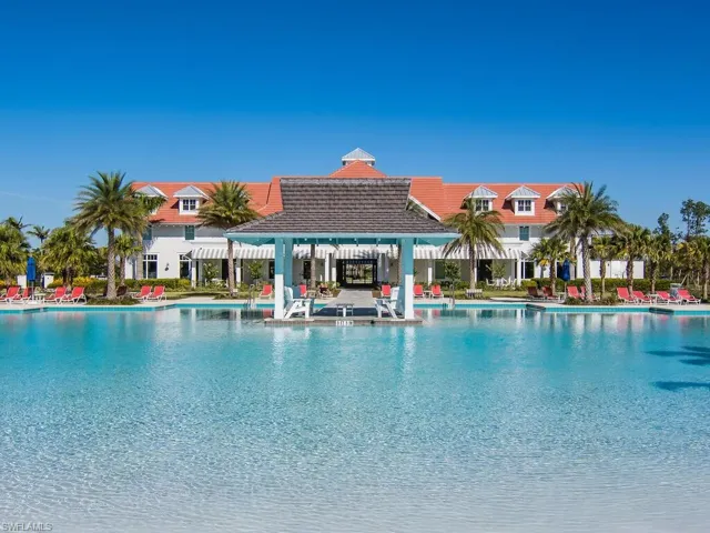 Community pool featuring a patio
