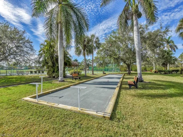 View of community featuring a yard