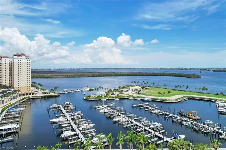 Water view featuring numerous boat docks