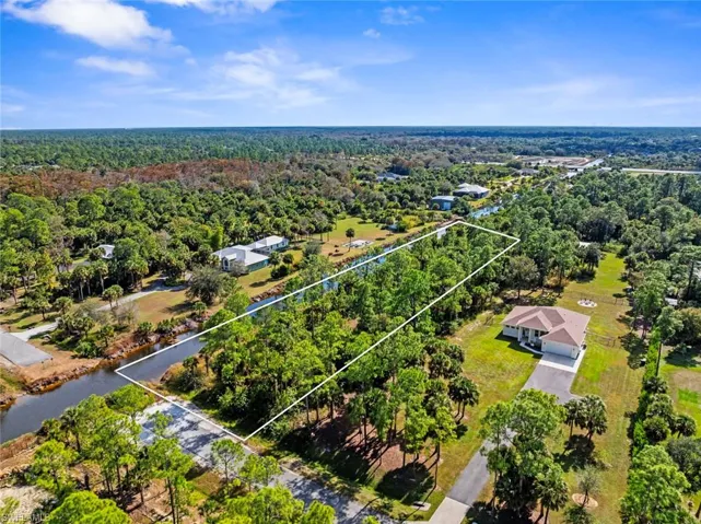 Private Canal Lot. Easy access to Vanderbilt Beach Rd. & Randall Ave. *Note: Lot line is in the water. Lines are approximate.  Survey available upon request.