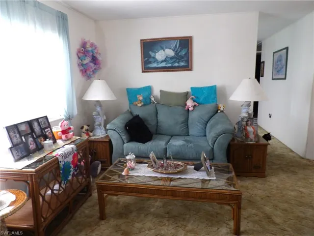 Sitting room with carpet flooring