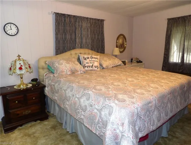 Primary Bedroom with carpet flooring