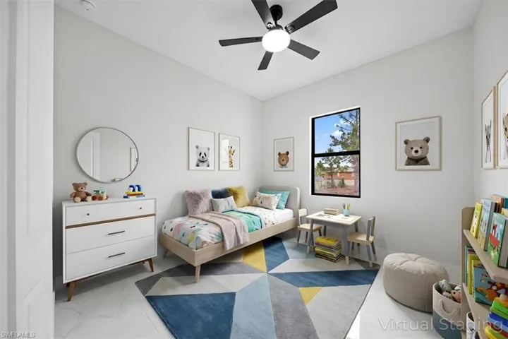 Bedroom with ceiling fan and light marble finish floors