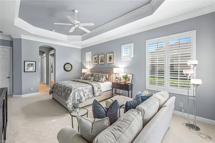 Fabulous primary bedroom with a sitting area